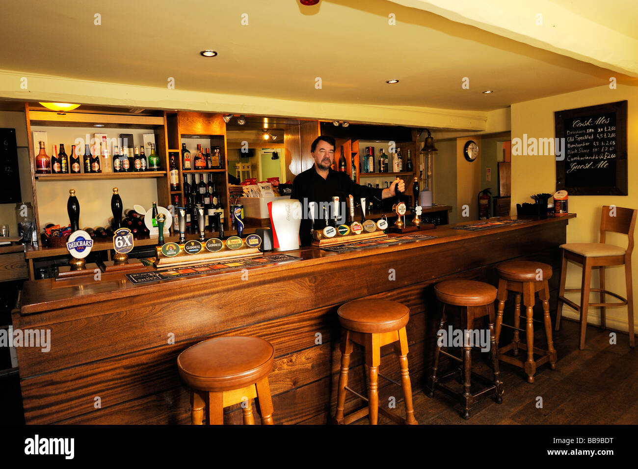 The landlord of the Golden Lion Public house in Ashton Hayes Britains