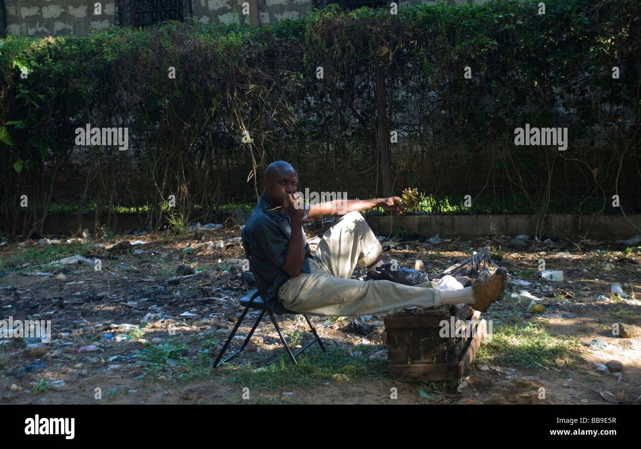 A man sat chewing Miraa Stock Photo Alamy