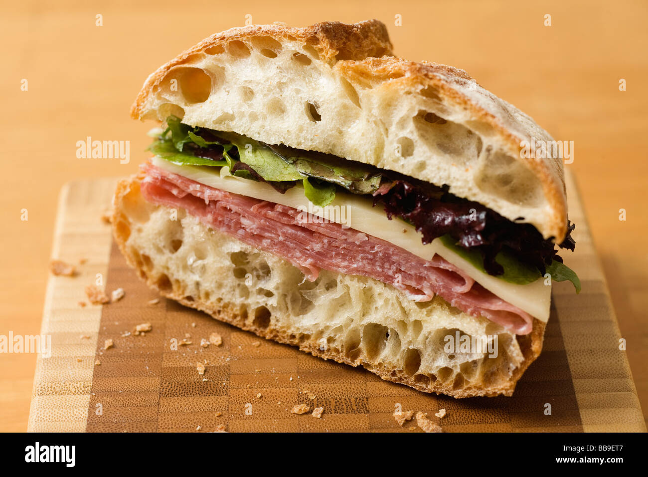 Salami sandwich made with organic sopressata salame Stock Photo Alamy