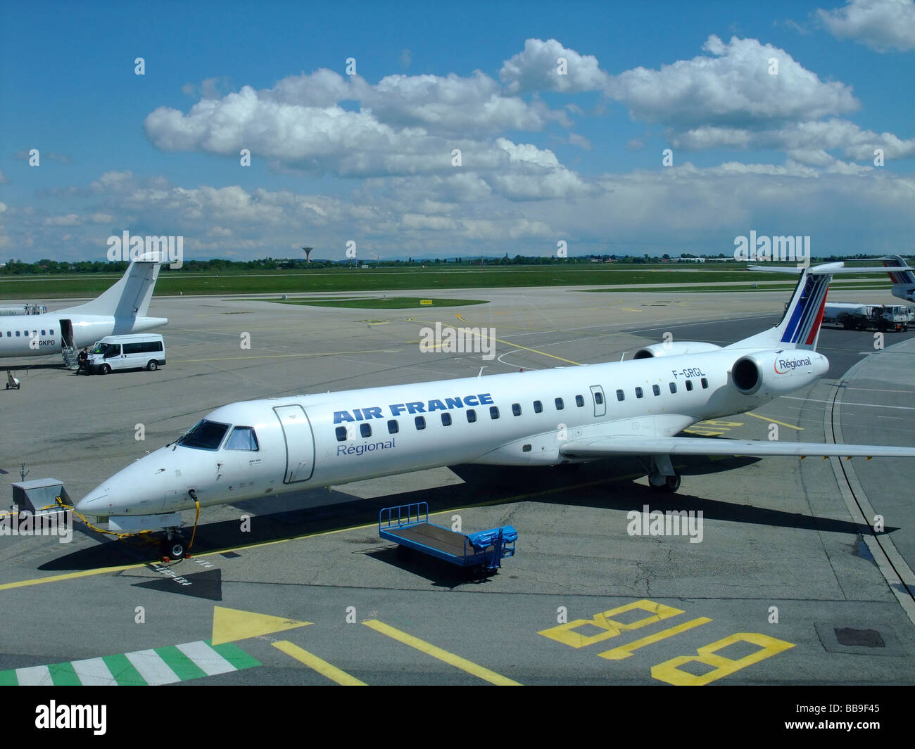 Embraer ERJ-145 regional jet of the company Regional (flying for Air France) on the parking at Lyon Saint Exupery airport Stock Photo