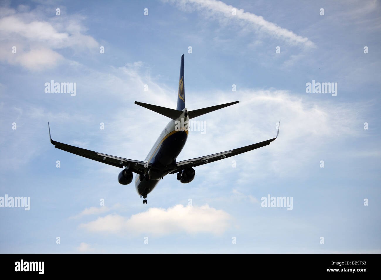 A passenger airplane getting ready to land Stock Photo