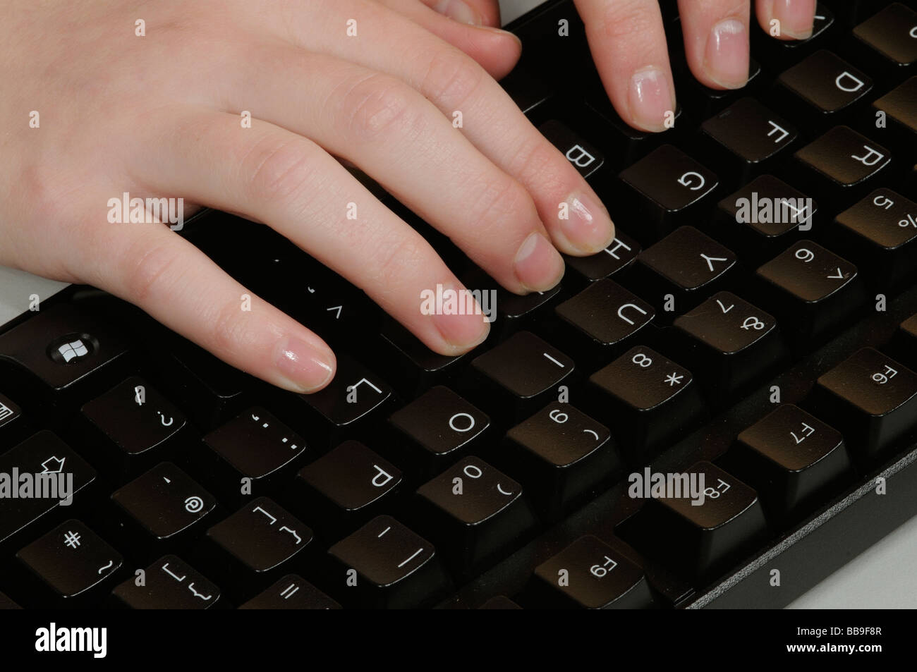 Using Toes Keyboard Hand girl touching keyboard on hi-res stock photography and images - Alamy