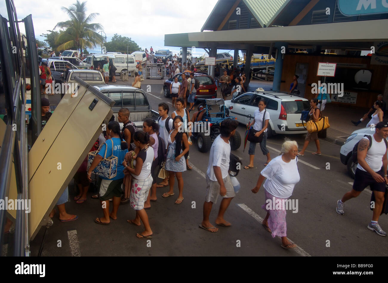 Moorea ferry terminal with many locals transferring to other forms of transport to get around the island Tahiti French Polynesia Stock Photo