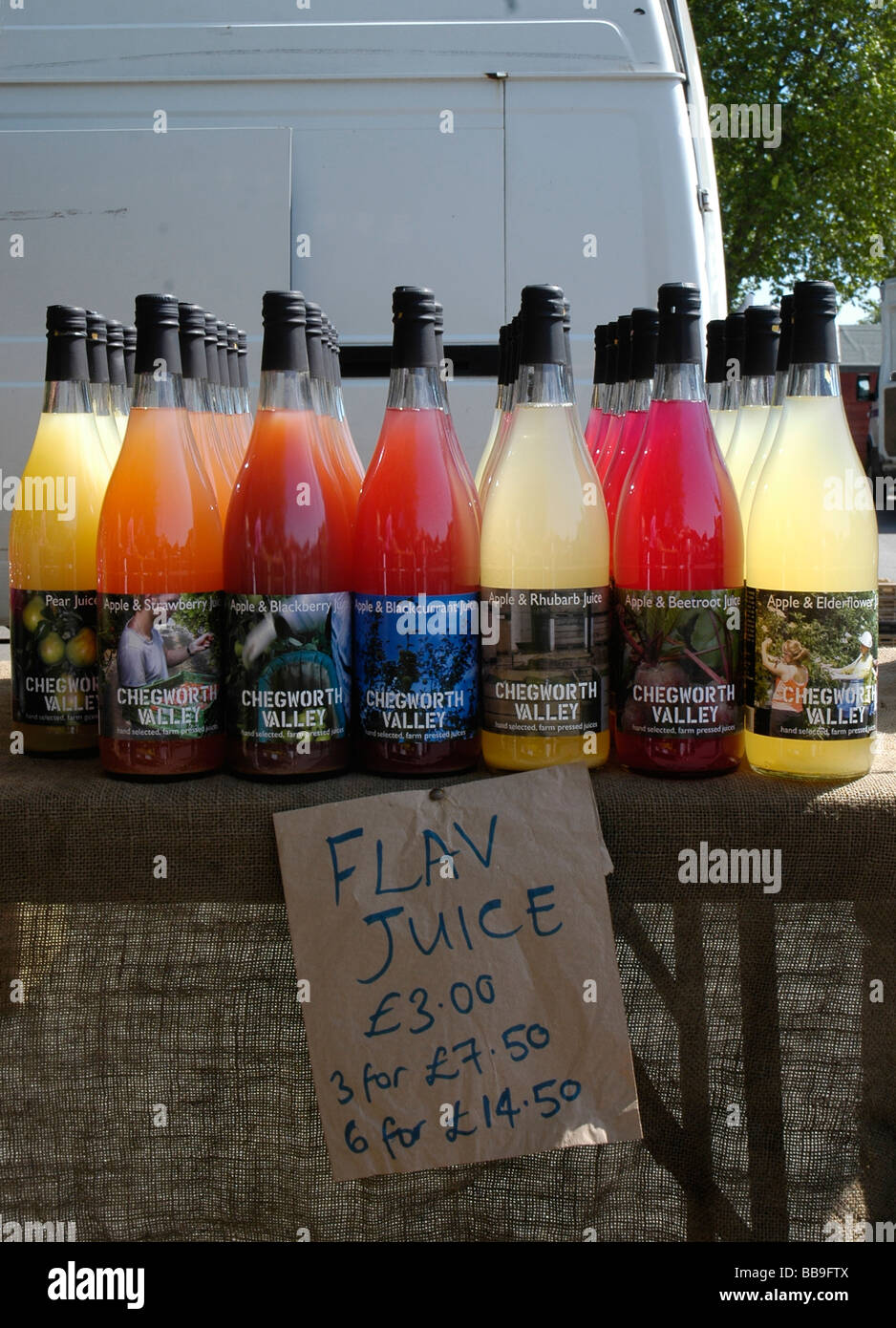 Fresh fruit juice for sale at Farmers market in Merton London Stock