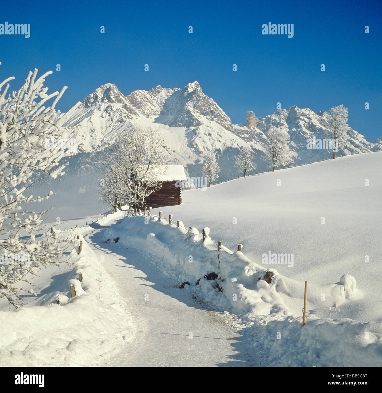 countryside in wintertime near town of saalfelden region of pinzgau county of salzburg austria Stock Photo