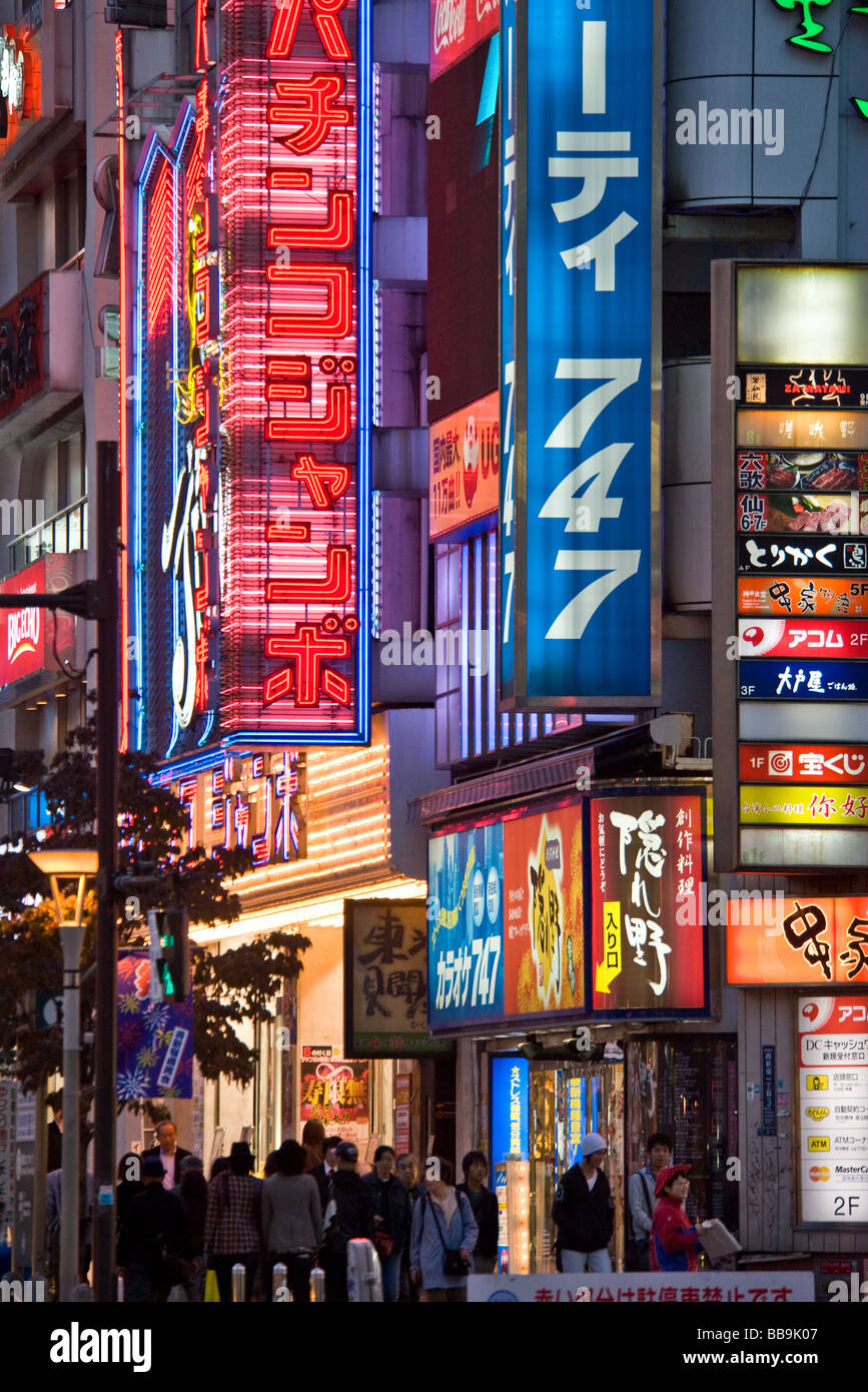 Neon signs at dusk in the Kabukicho area Shinjuku district Tokyo Japan ...