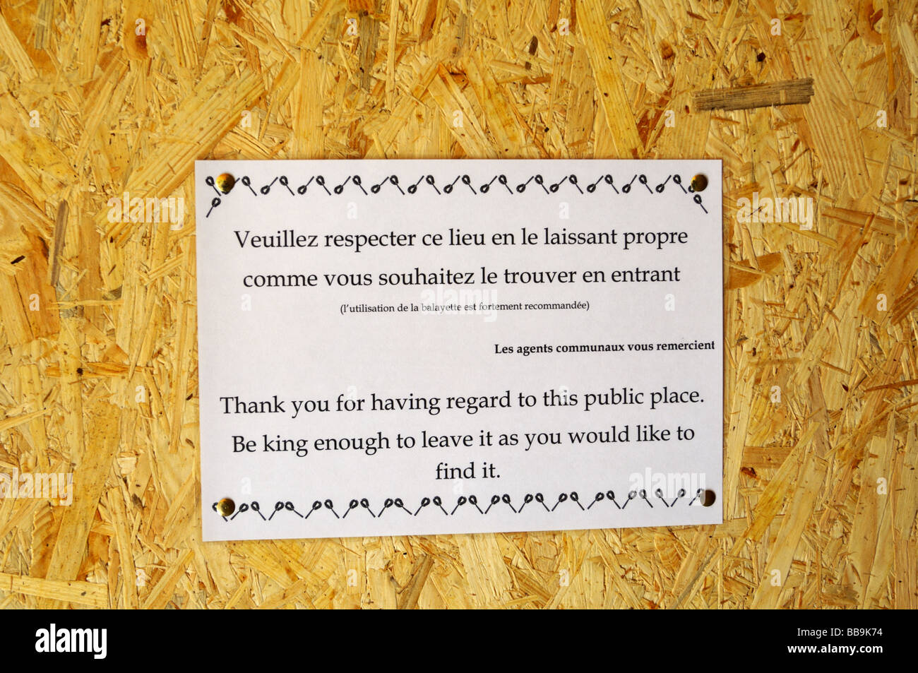 French public toilet notice in French and English Stock Photo Alamy