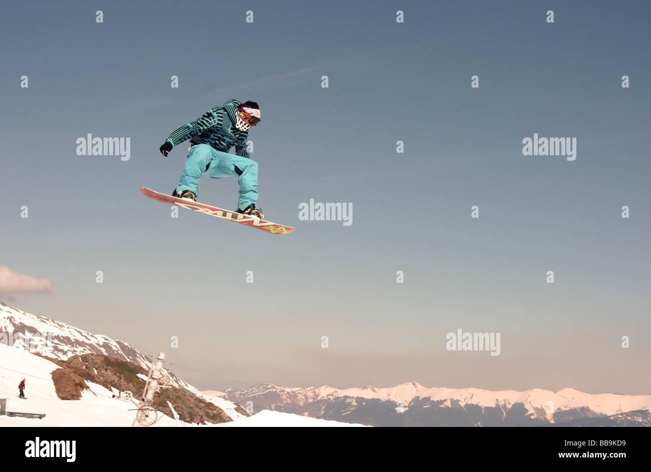 Winter Sports;Snow Boarder; Jumping Sequence No.6.;Male boarder about to land after a 'Big Air' jump. Stock Photo