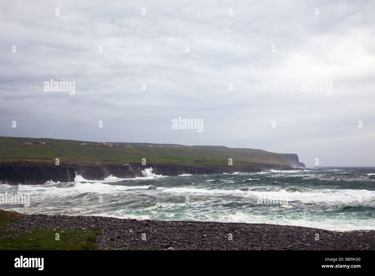 Atlantic storm sends waves crashing onshore at Doolin Cliffs of Moher County Clare Eire Ireland Irish Republic Europe EU Stock Photo