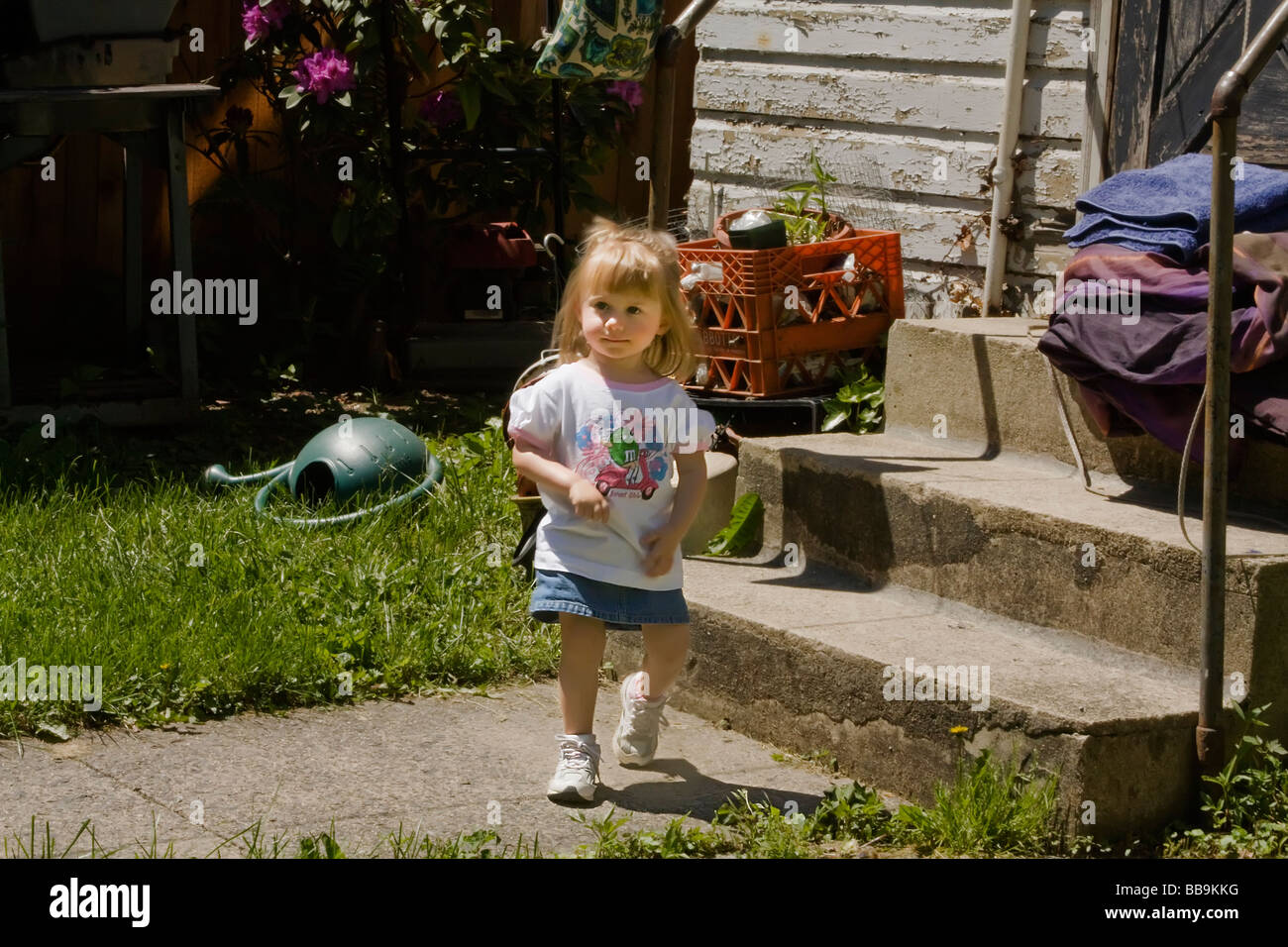 Little girl on the move Stock Photo