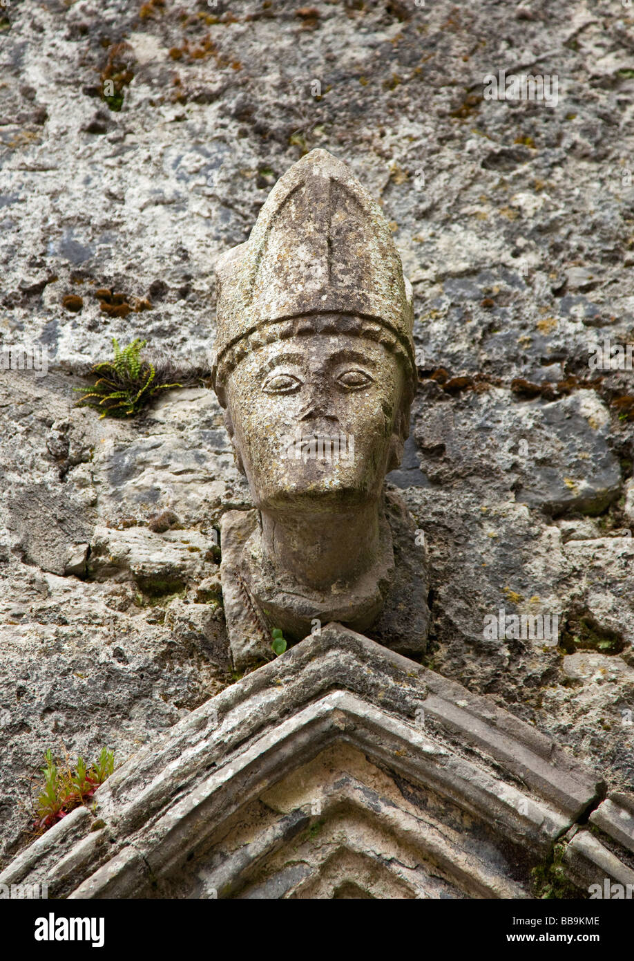 Carved head of bishop in Kilfenora Cathedral Burren County Clare Ireland Eire Irish Republic Europe EU Stock Photo