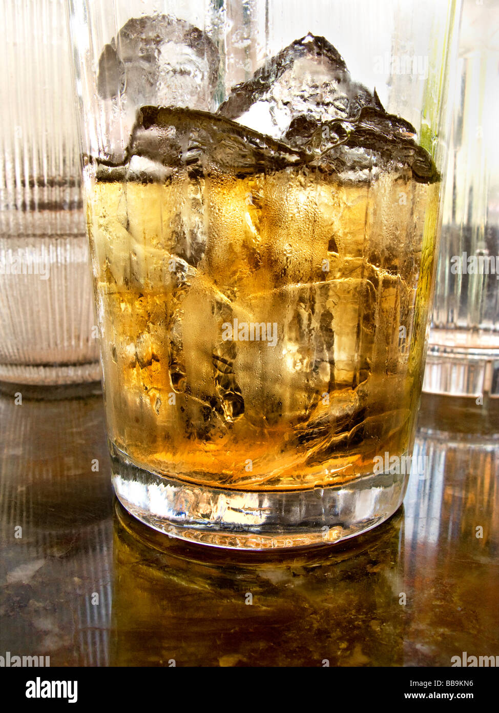 Close up of beverage drink with ice on marble table Stock Photo
