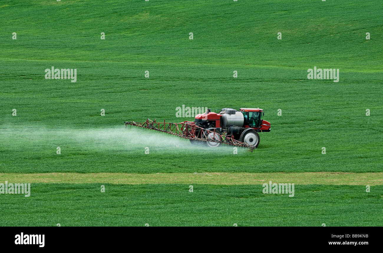 Truck spraying crops, Western Idaho USA Stock Photo
