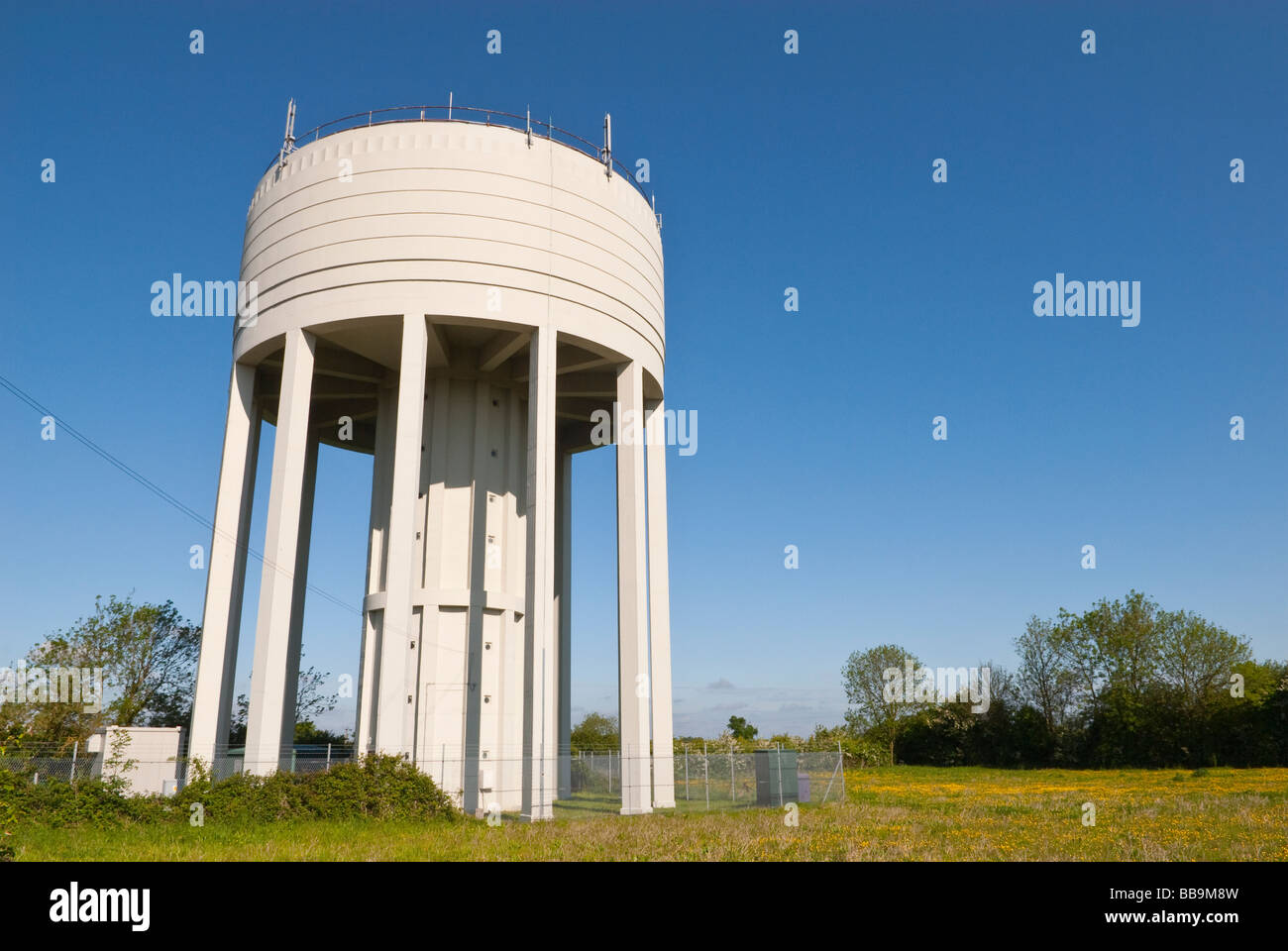 The water tower holding water supplies of Essex & Suffolk water situated in Shadingfield,Suffolk,Uk Stock Photo