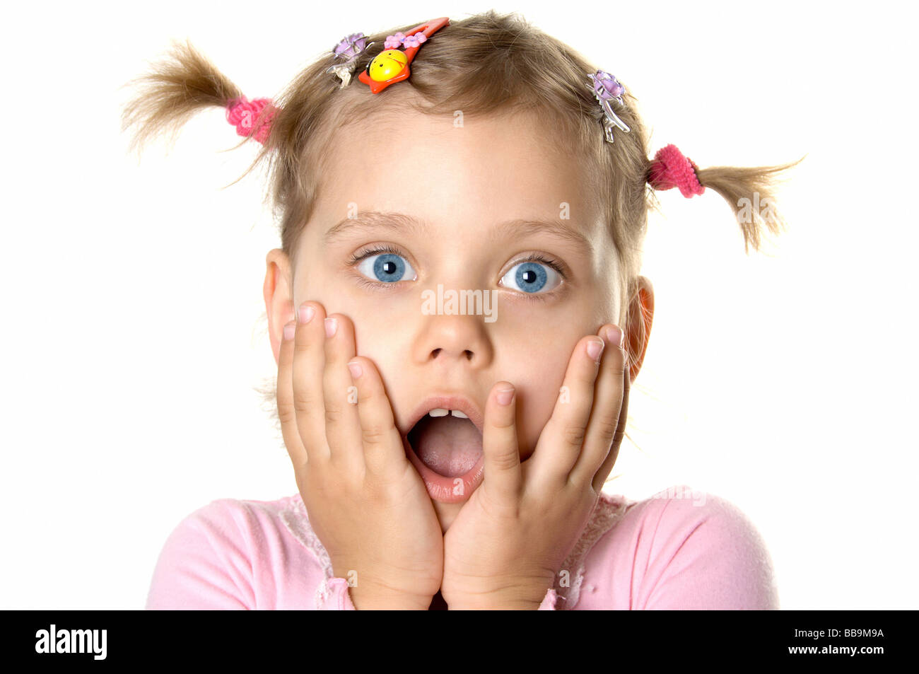 Surprised little girl Isolated on white Stock Photo - Alamy