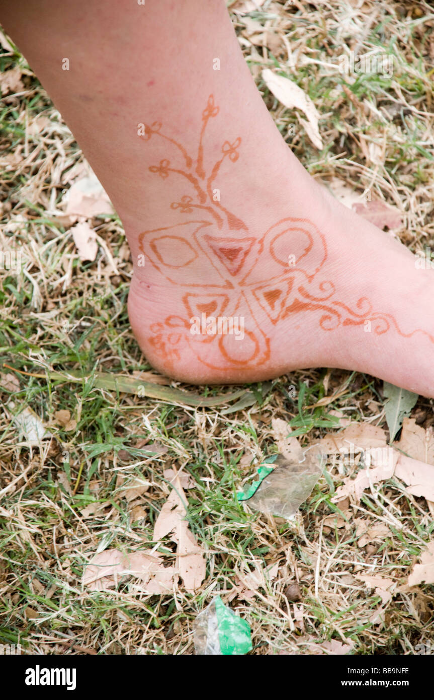 Closeup Of Female Legs And Hands With Henna Tattoo On The Feet Black And  White Photo Gently Feminine Graceful Decoration Respect For A Woman Love  And Take Care Of Yourself Stock Photo