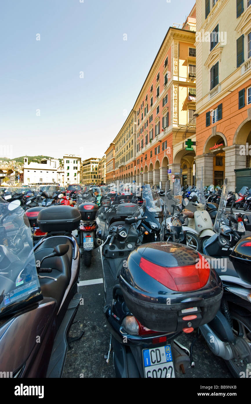 Scooter parking along the avenue of Ancient Port Genoa Italy Stock Photo Alamy