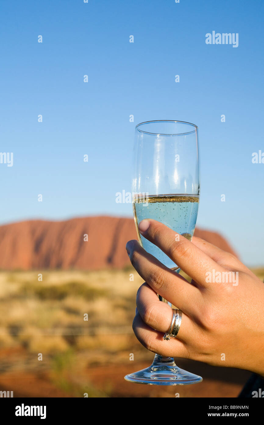 Sunset drink at Uluru (Ayers Rock).  Uluru-Kata Tjuta National Park, Northern Territory, AUSTRALIA Stock Photo