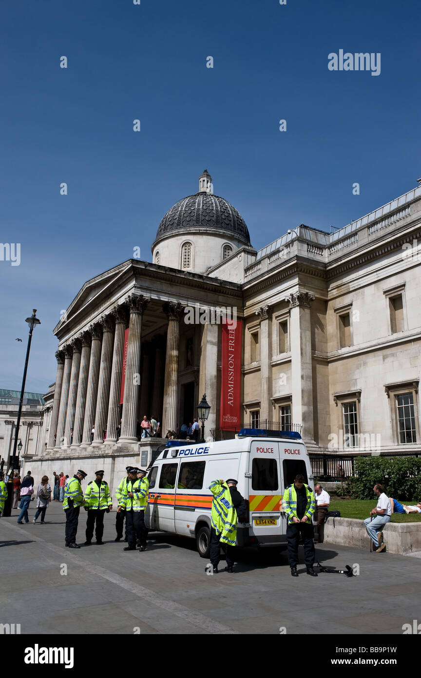 Police - Metropolitan Police Officers preparing for duty outside the National Gallery in London. Stock Photo