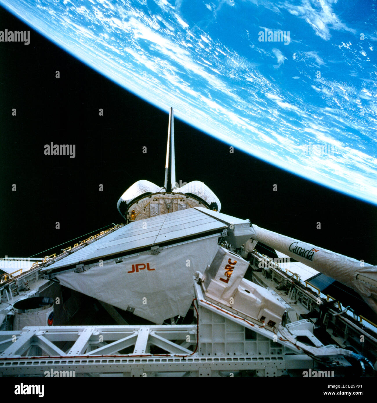 NASA Shuttle Endeavor  floating above earth Stock Photo
