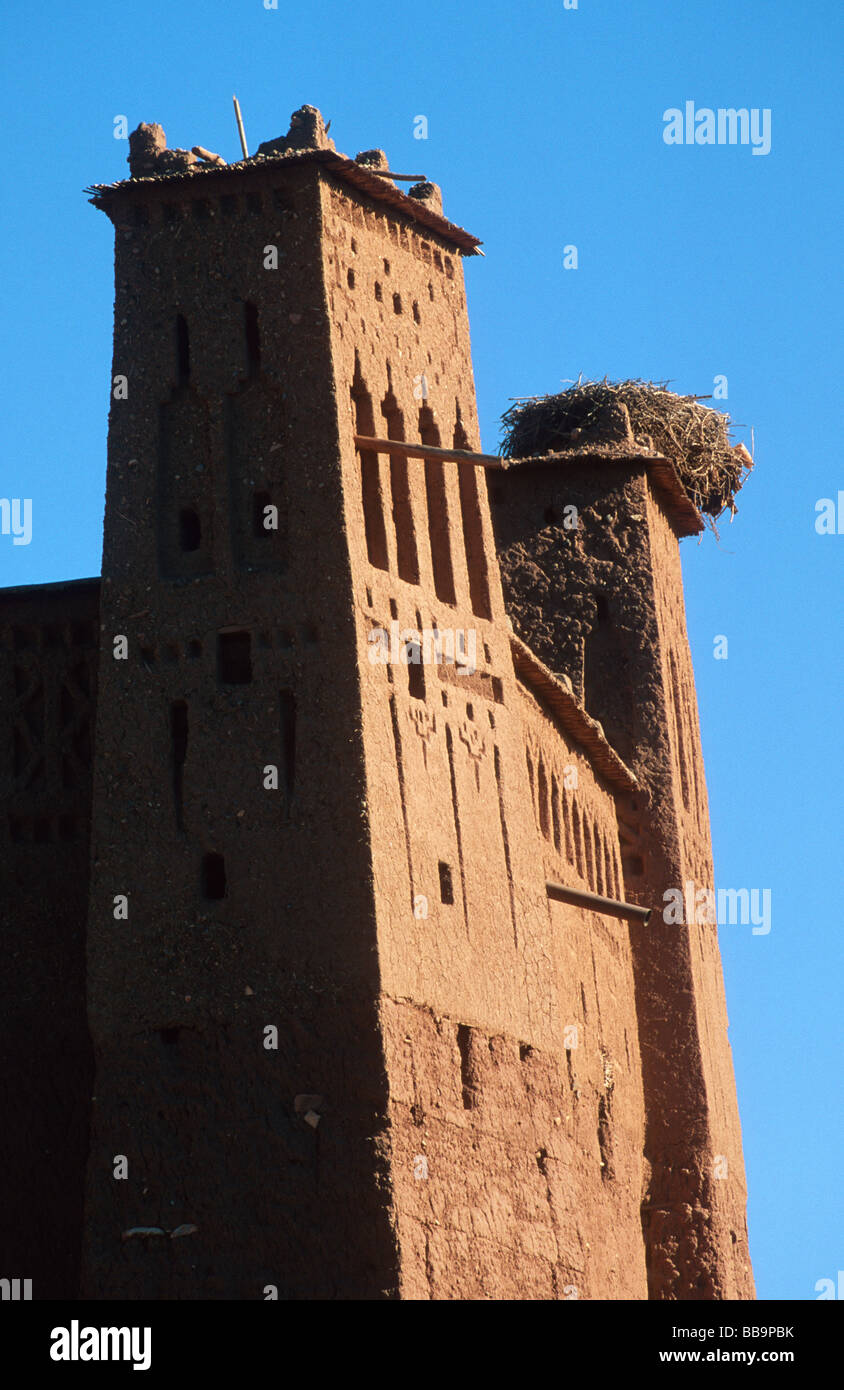 Kasbah towers with stork nest of Ait Ben-Haddou (Unesco world heritage site), Atlas mountains, Morocco Stock Photo