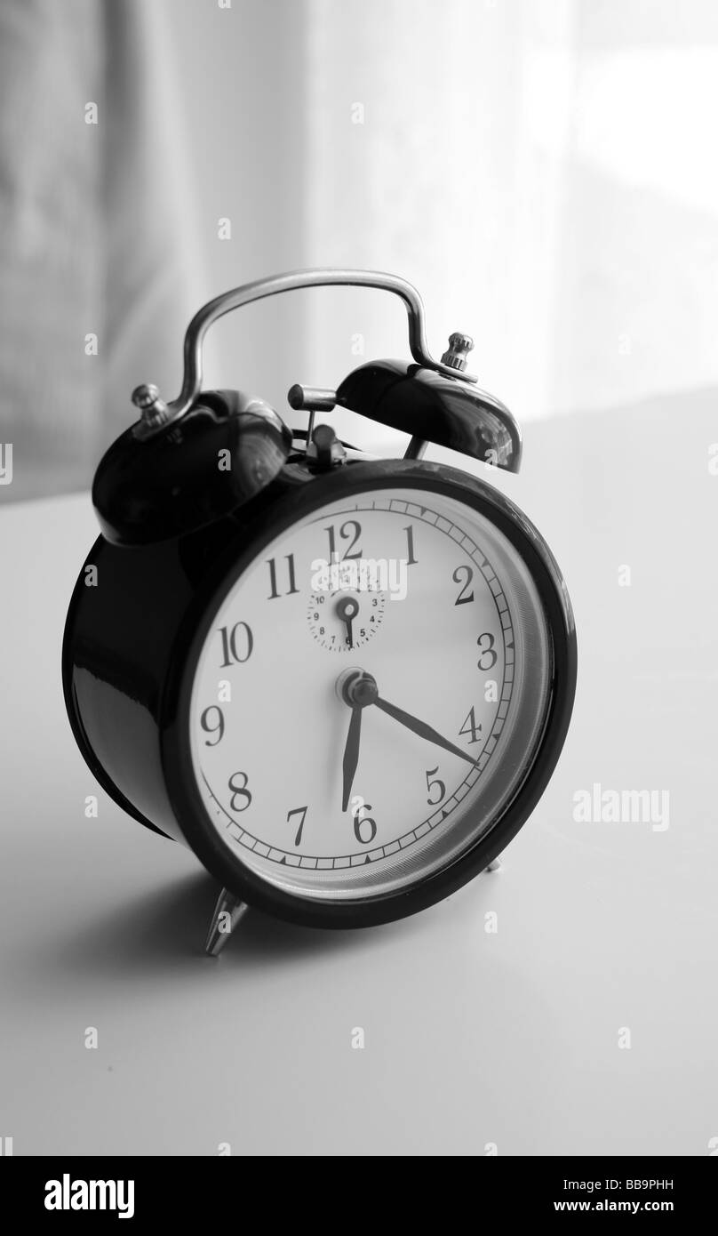 An alarm clock shot in black and white Stock Photo