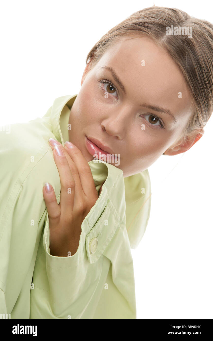 Young woman wearing green coat Stock Photo Alamy