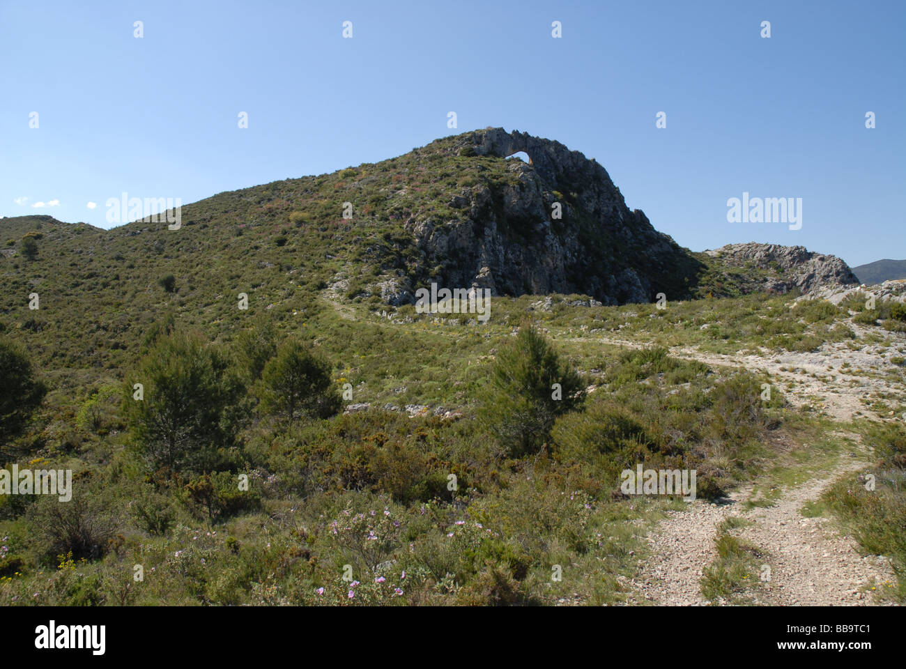 La Forada Rock Arch, Sierra de La Forada, near Alcala de La Jovada, Alicante Province, Comunidad Valenciana, Spain Stock Photo