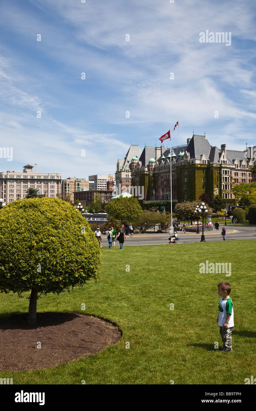 Boy on the lawn with hotel Empress in the background Victoria Day in ...