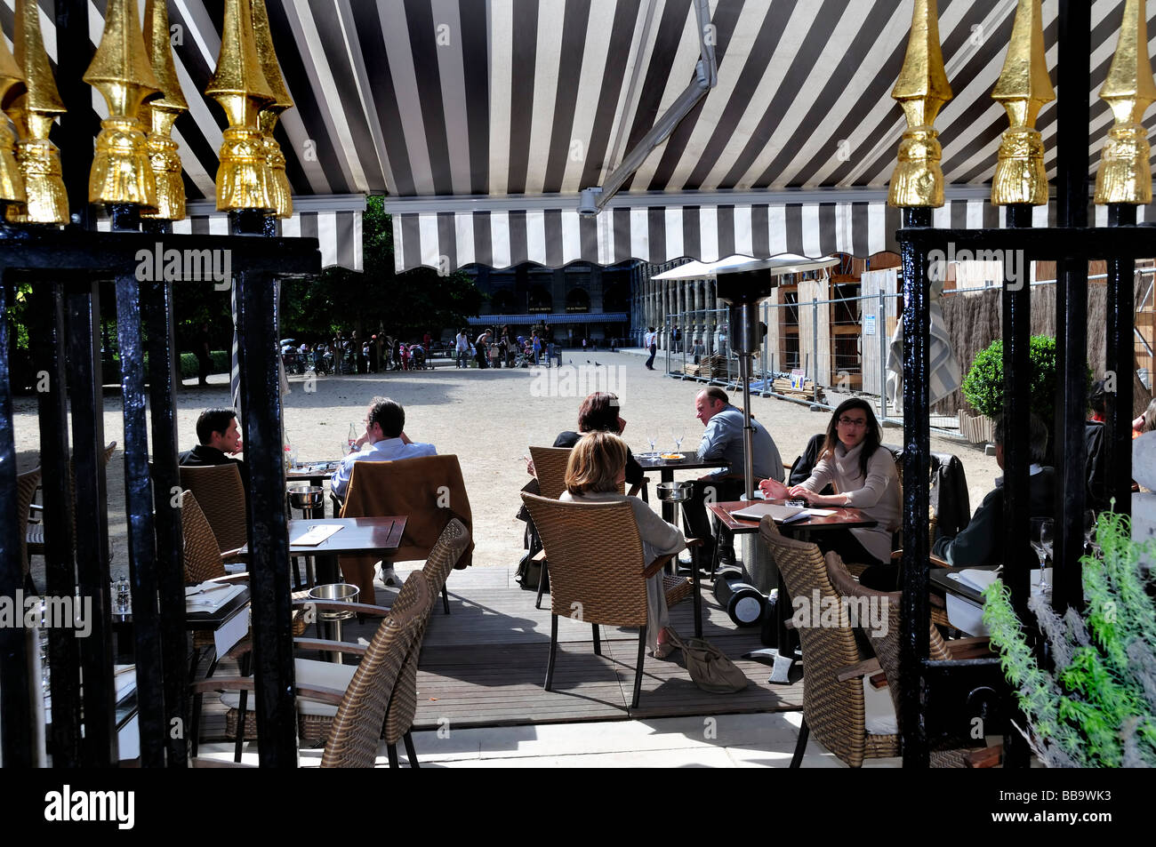 Paris France, French Café, French Bistro Restaurant, Sidewalk terrace, Tables in Public Park 'Jardin du Palais Royale' 'Le Palais Royal' Authentic, Stock Photo