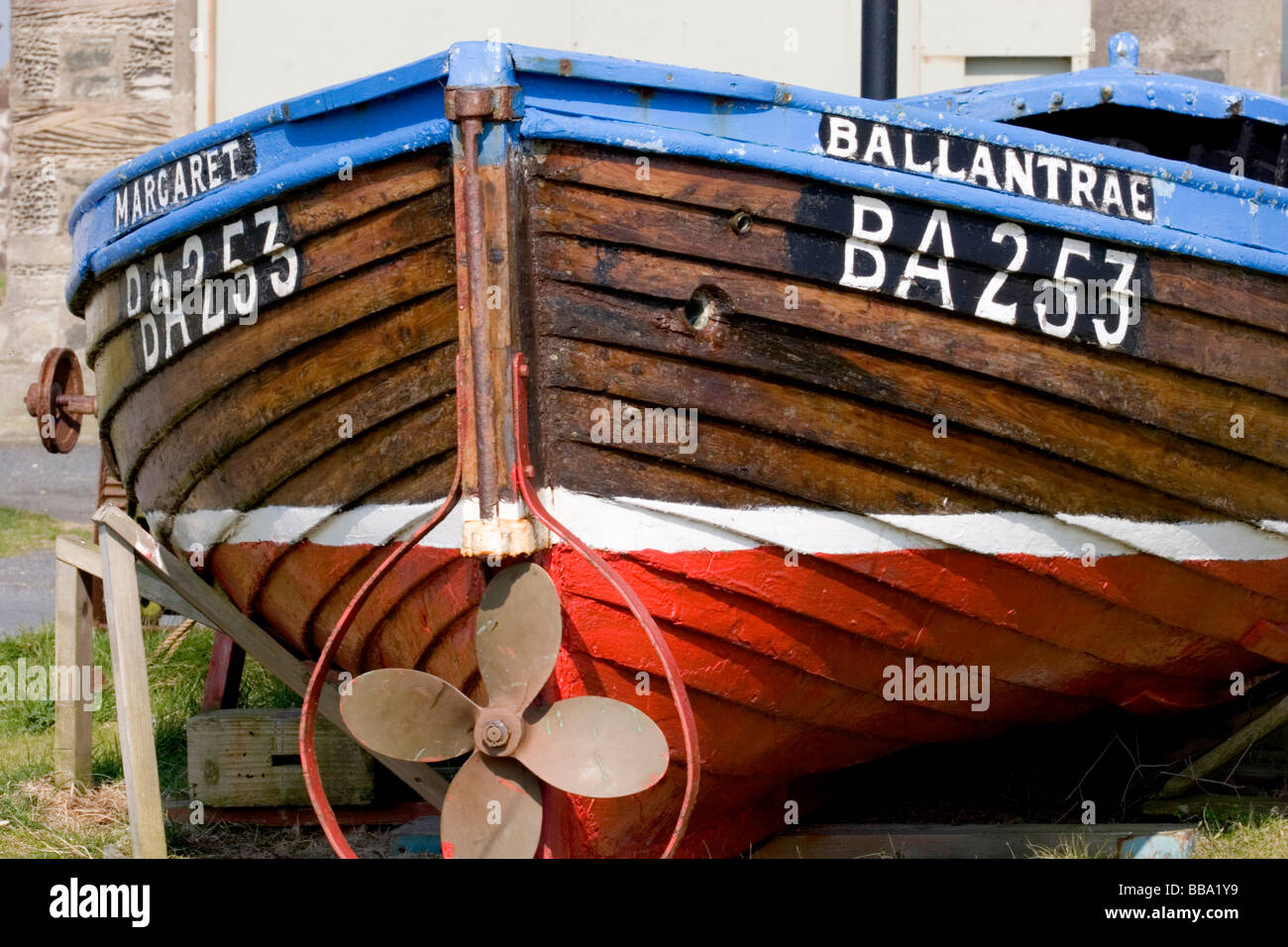 Small colourful fishing boat named 'Ballantrae' in the South Ayrshire