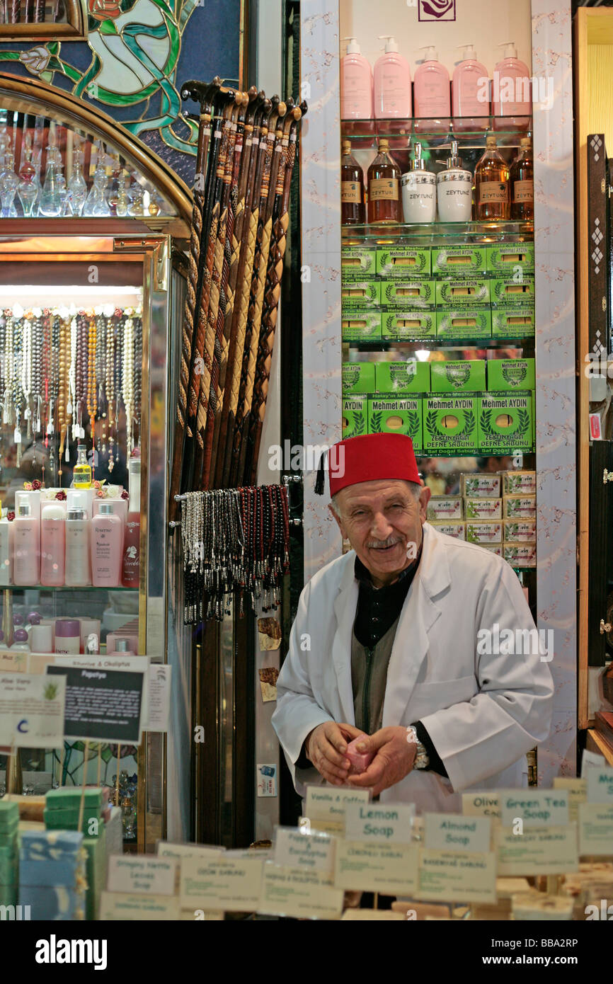 Pharmacist in the Spice Market in Istanbul with a Fez hat Stock Photo