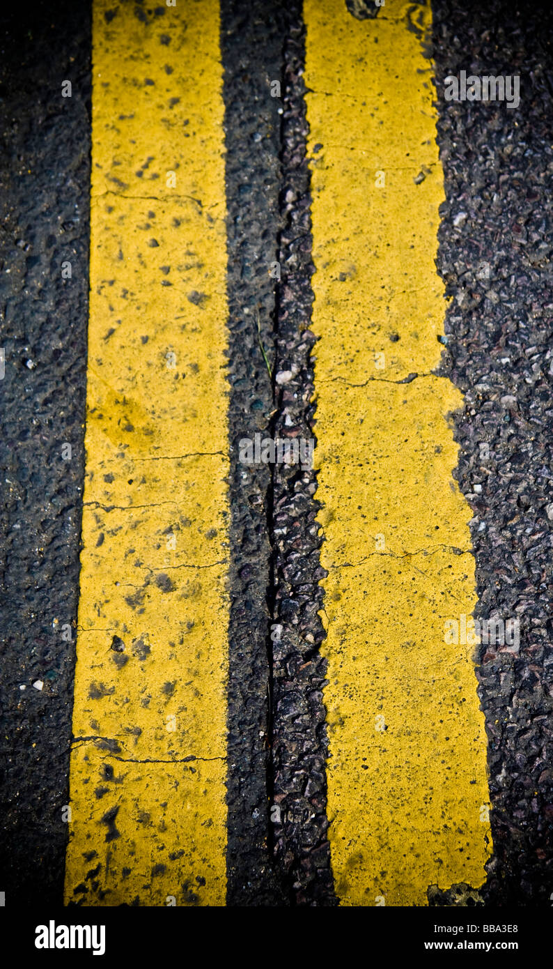 Abstract image of double yellow lines on the road Stock Photo Alamy