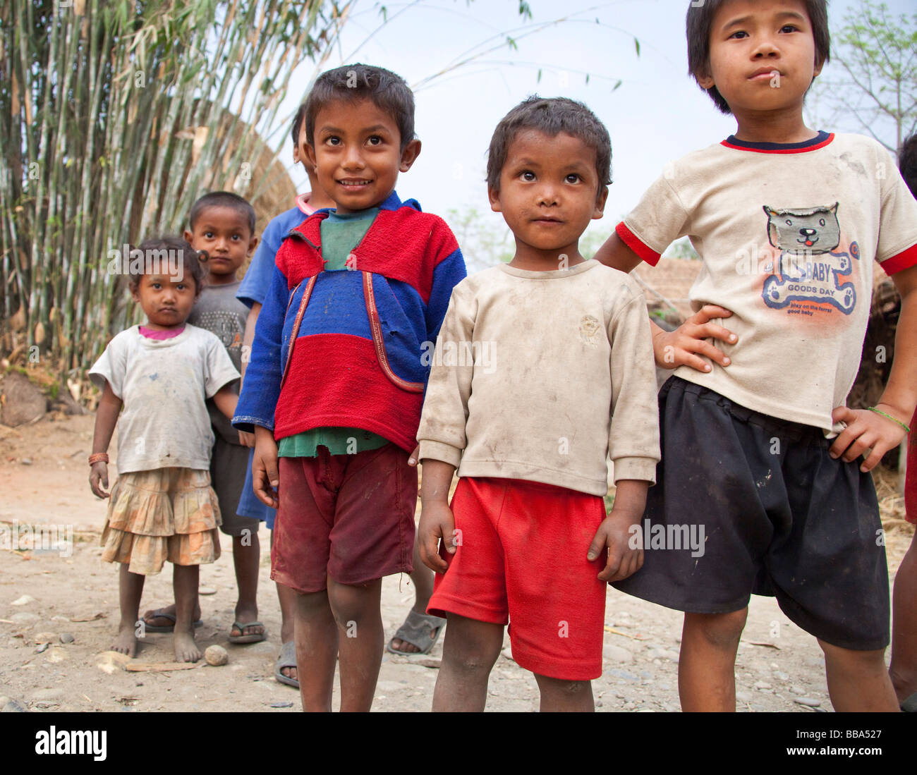 Young Children playing in street in remote village Chitwan National