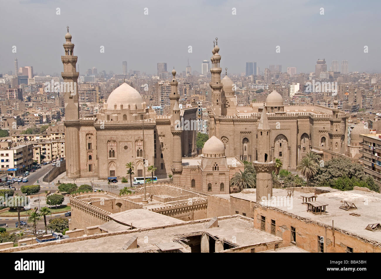 Old Cairo down town Egypt Sultan Hassan mosque left and Ali Al Rifai mosque right Stock Photo