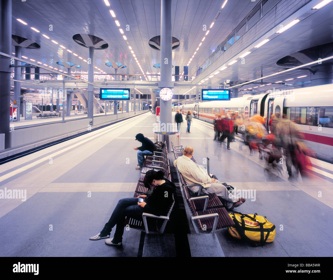 People boarding a fast ICE train at Berlin Central Station, Germany. Stock Photo