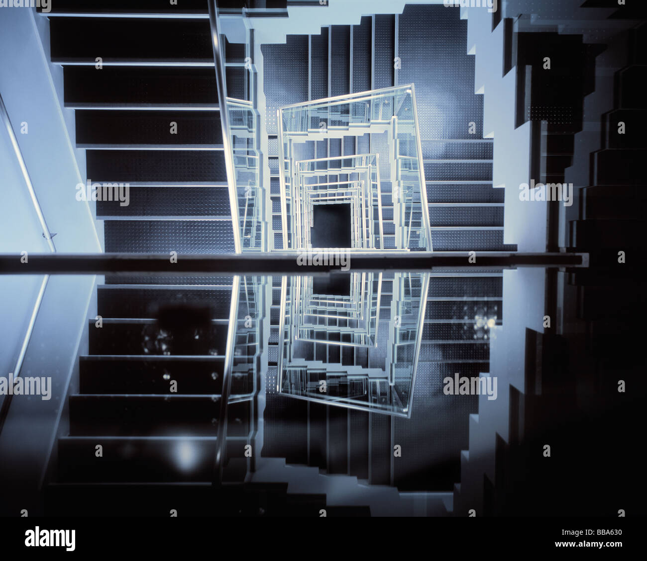 Kaleidoscopic image of stairway and its reflection. Stock Photo
