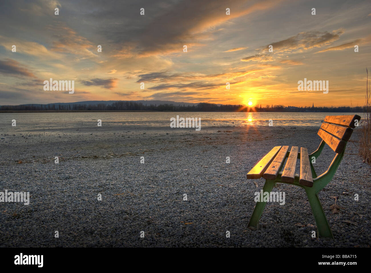 Bench at sunset, Lake Constance, Markelfingen, Radolfzell, County of Constance, Baden-Wurttemberg, Germany, Europe Stock Photo