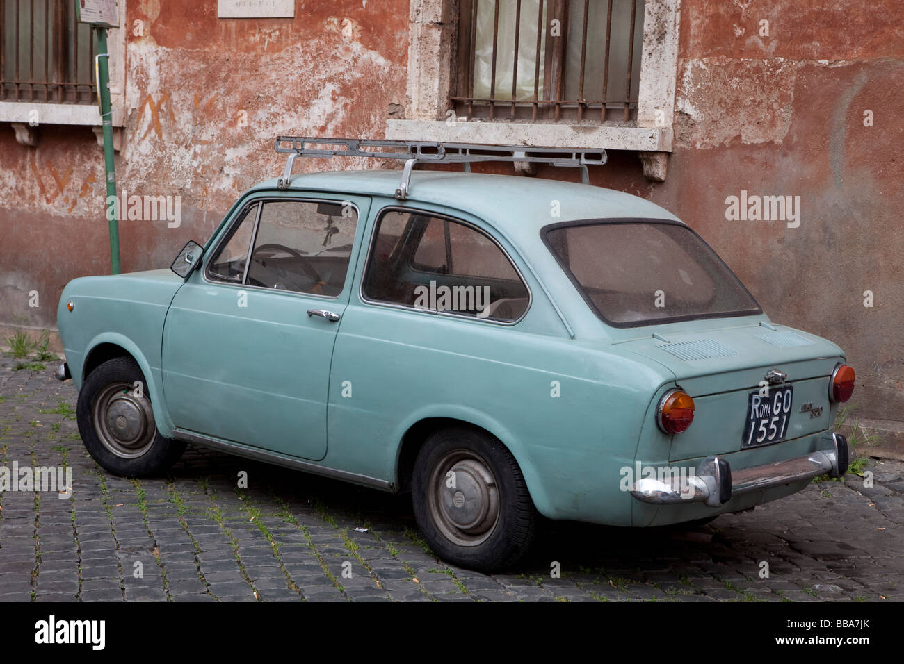 Wall of house with a Fiat 850 in front, Trastevere, Rome, Italy Stock Photo
