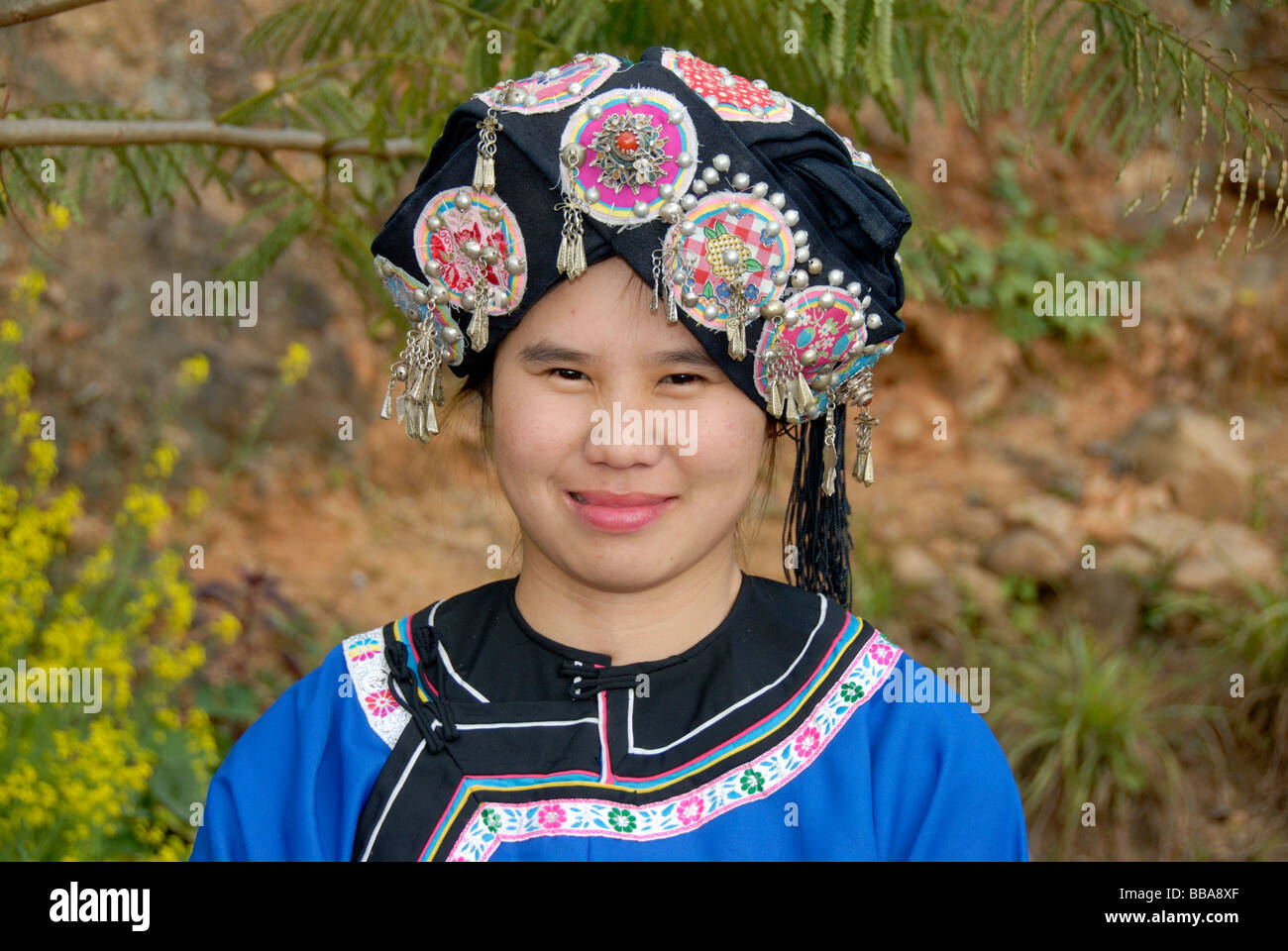Portrait of a young woman of the Hor-Lolo ethnicity, in traditional ...
