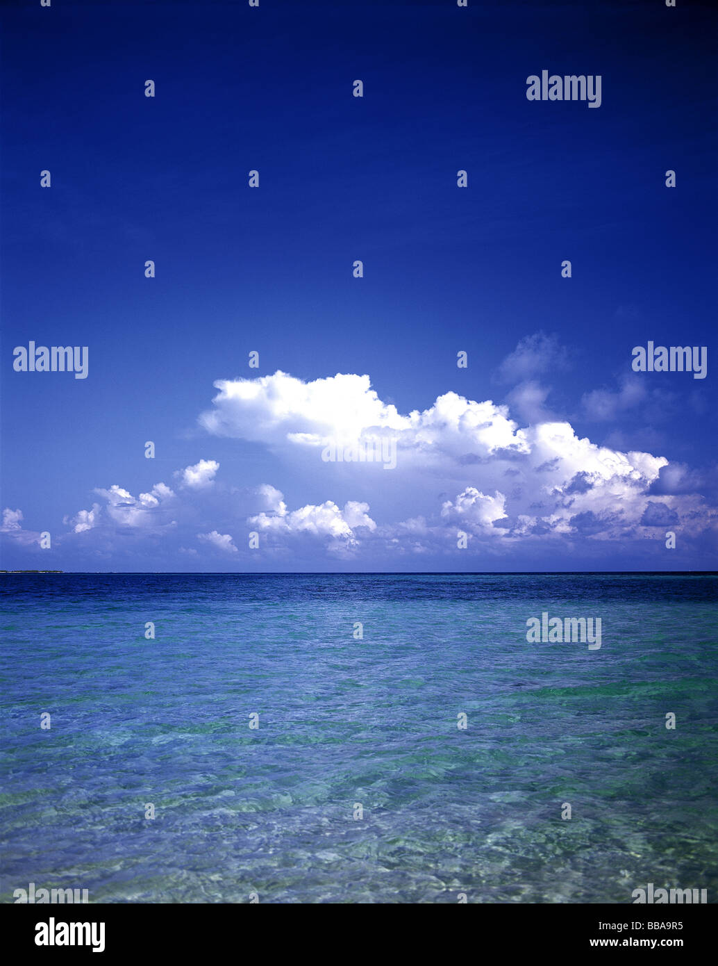 Blue ocean clouds in clear hi-res stock photography and images - Alamy