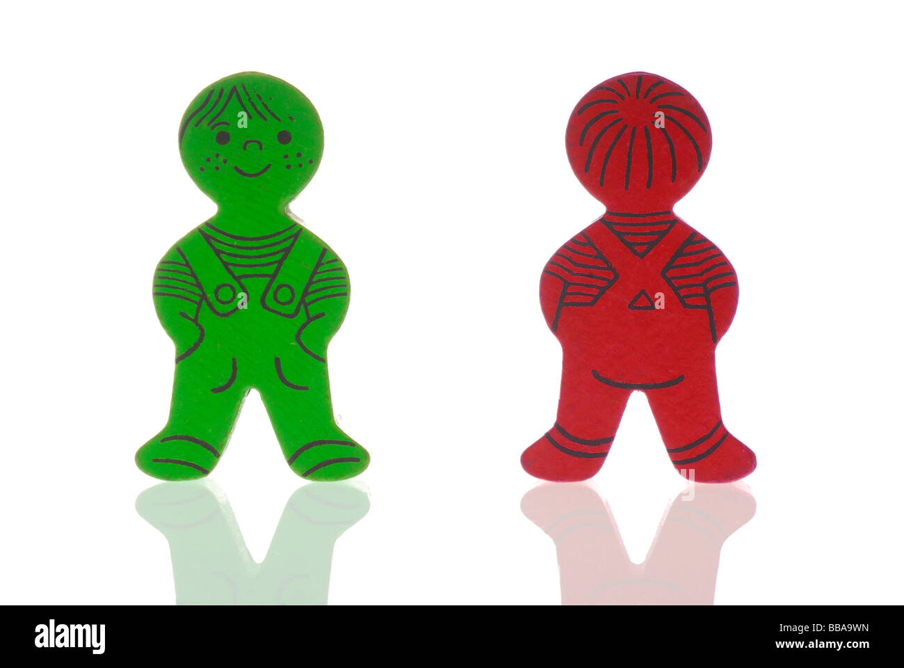 Two game figures, one looking forward, the other looking backward, symbolic image for pros and cons Stock Photo