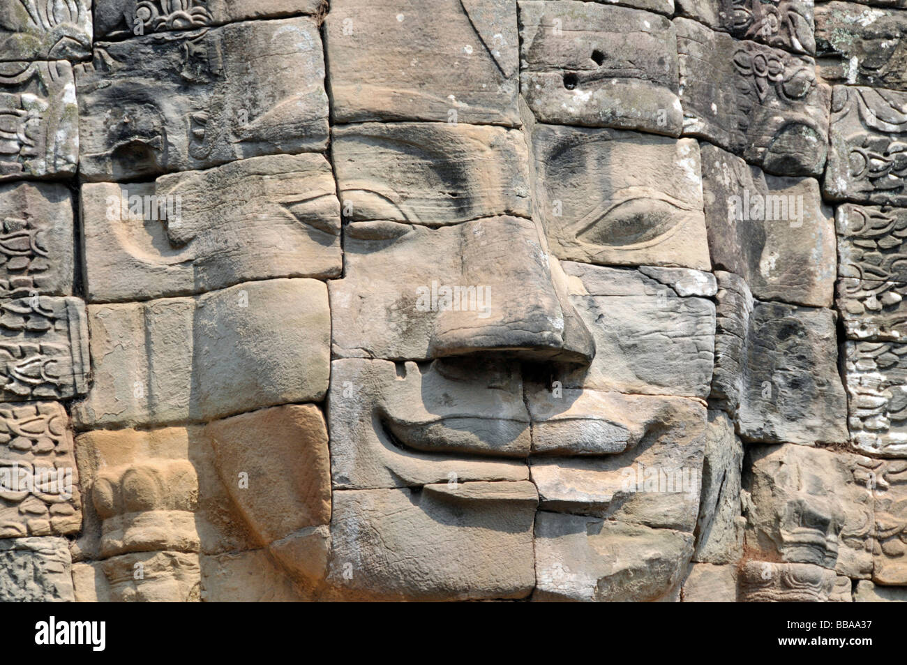 Huge face of the Bodhisattva Lokeshvara chiselled in stone, also called Avalokiteshvara, Bayon Temple, Angkor Thom, UNESCO Worl Stock Photo