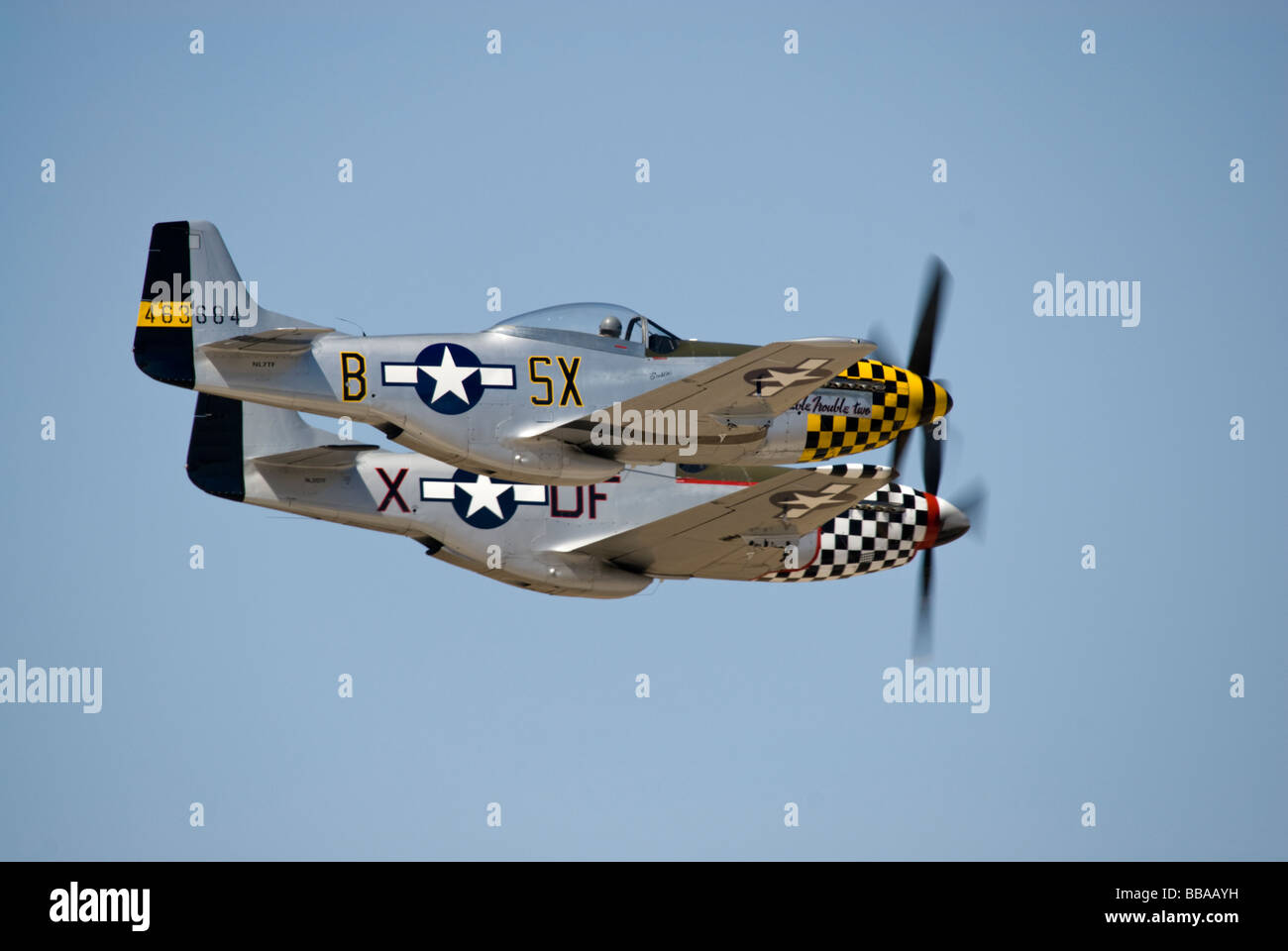 Two P-51 Mustangs fly a close formation Stock Photo