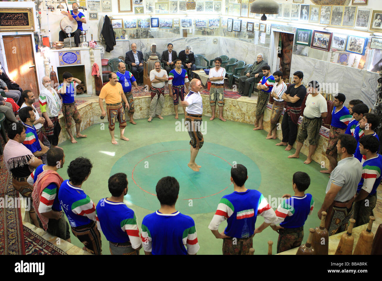 Zurkhaneh is traditional Iranian sport. Man practising gyration Esfahan ...