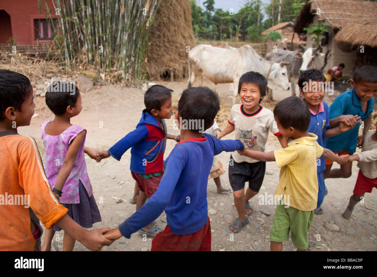 Young Children playing in street in remote village Chitwan National