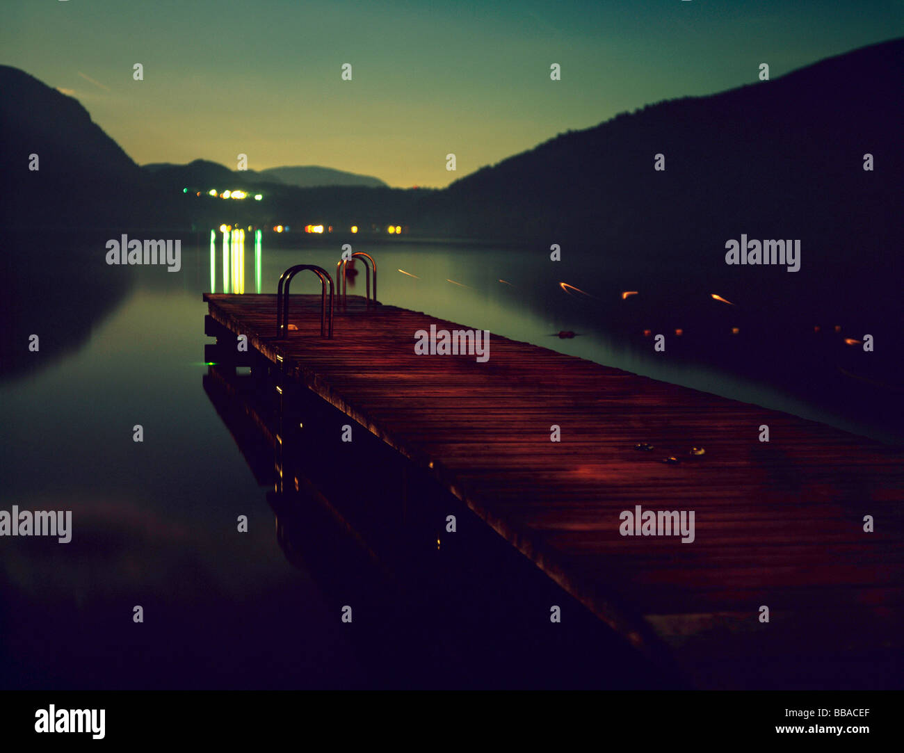 A wooden jetty at dusk Stock Photo