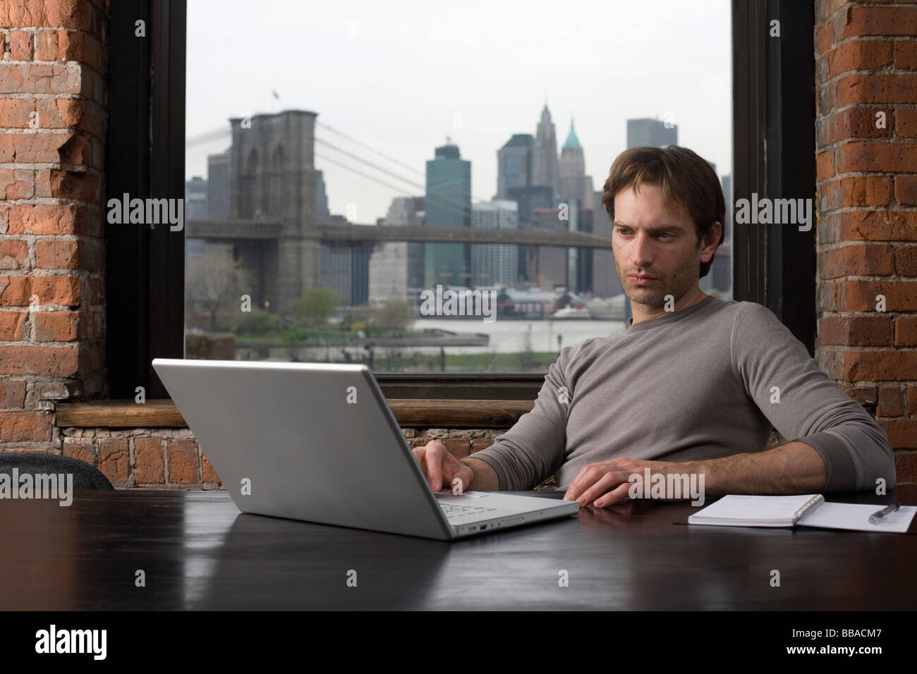 A man using laptop Stock Photo - Alamy