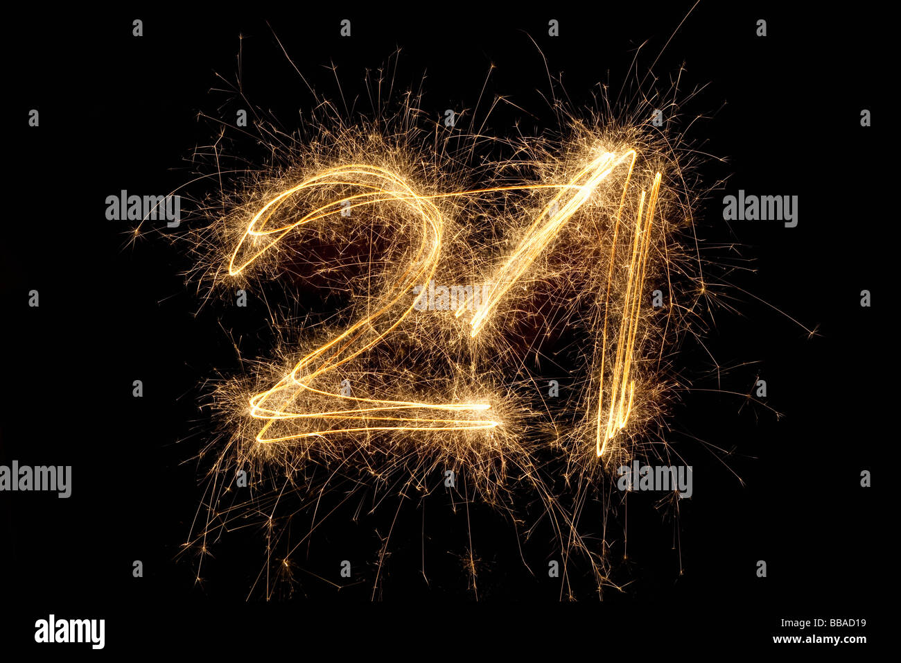 The number 21 written with a sparkler Stock Photo