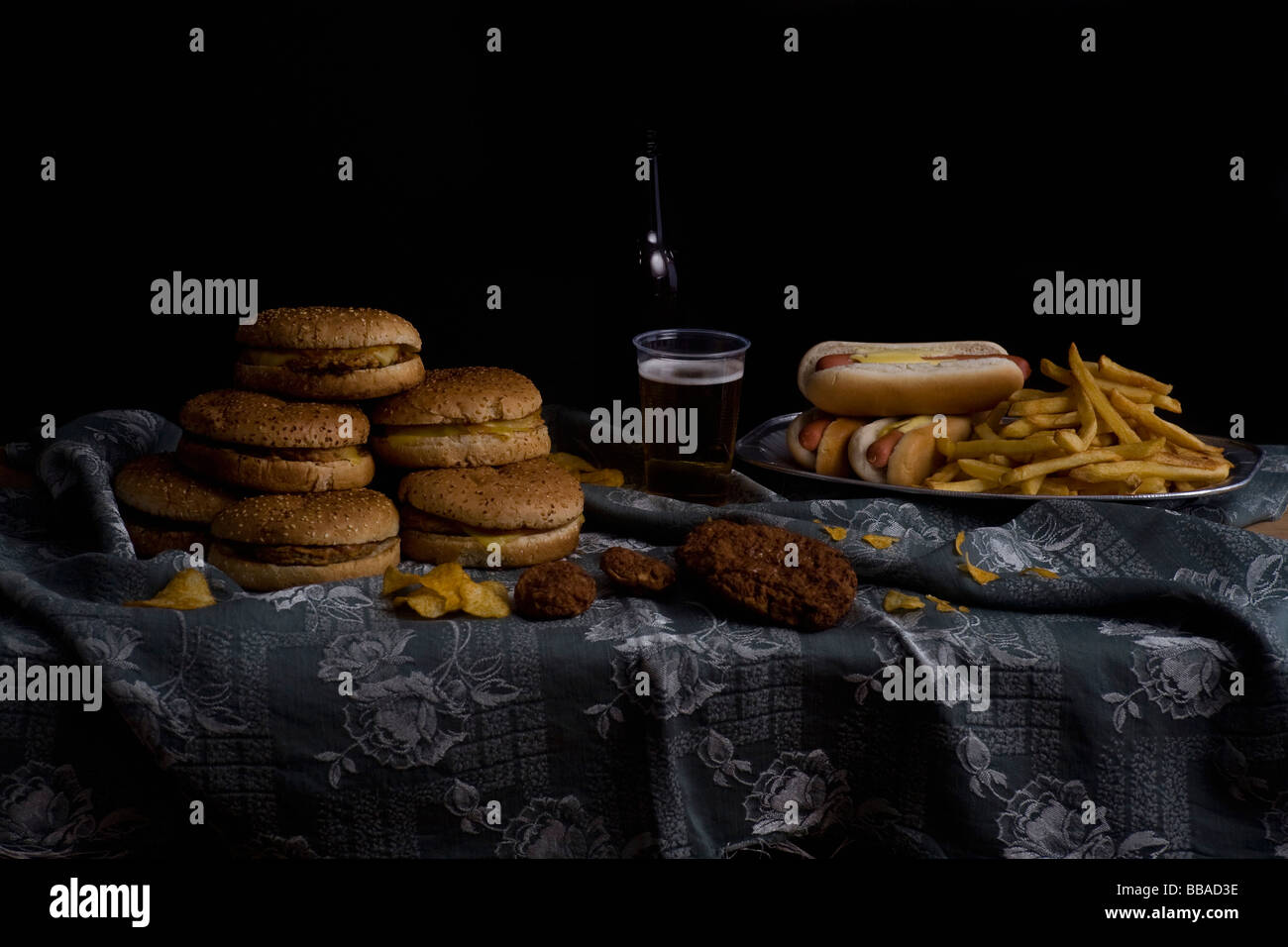 Variety of fast food and beer bottle, still life Stock Photo